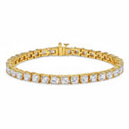 My Store 4 custom princess cut diamond tennis bracelet in yellow gold with a secure box clasp and articulated links.