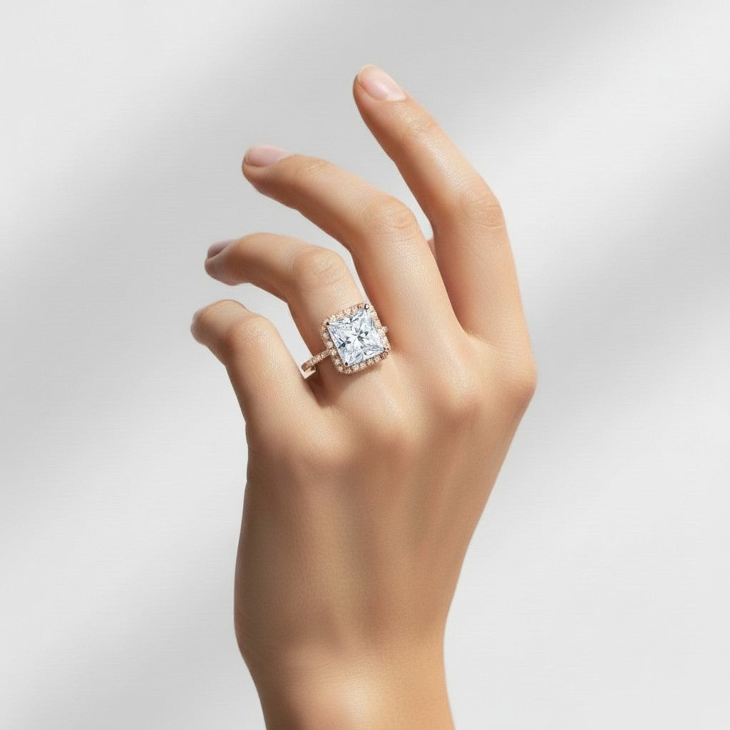 My Store 4 princess cut engagement ring with a square micro-pavé halo and diamond band on a woman's hand