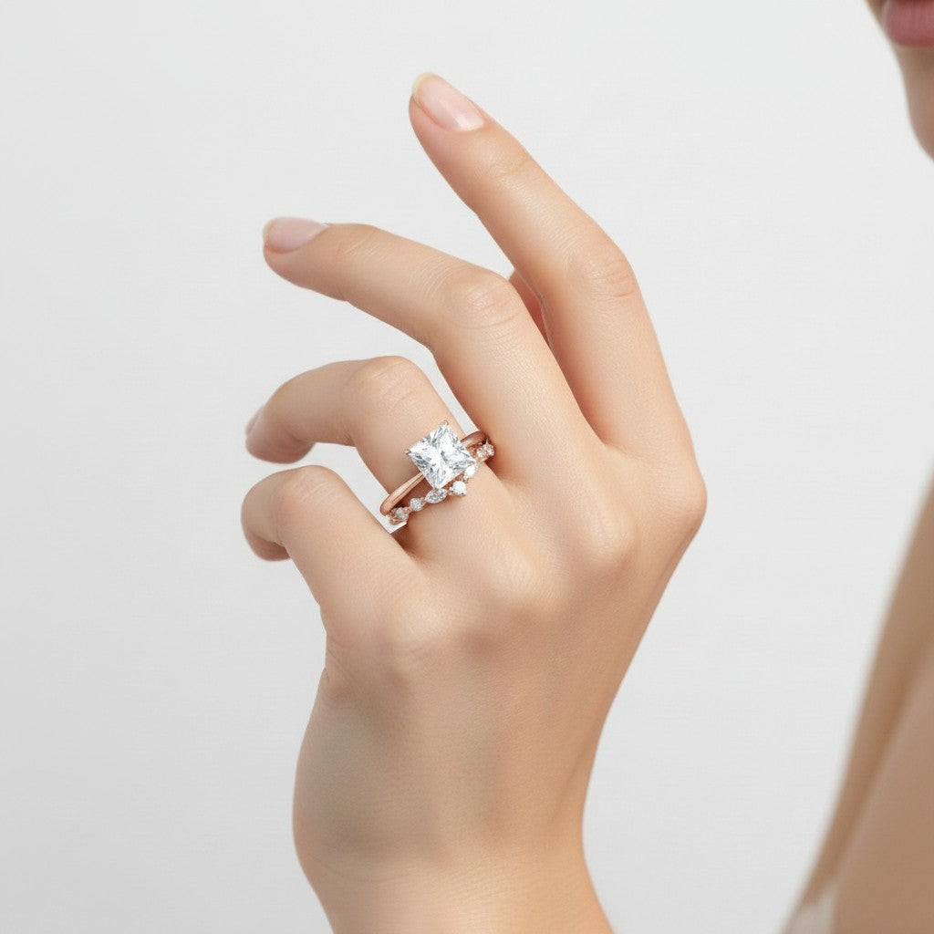 My Store 4 18K solid gold princess-cut lab diamond ring set worn on a woman's finger, showcasing elegant brilliance.