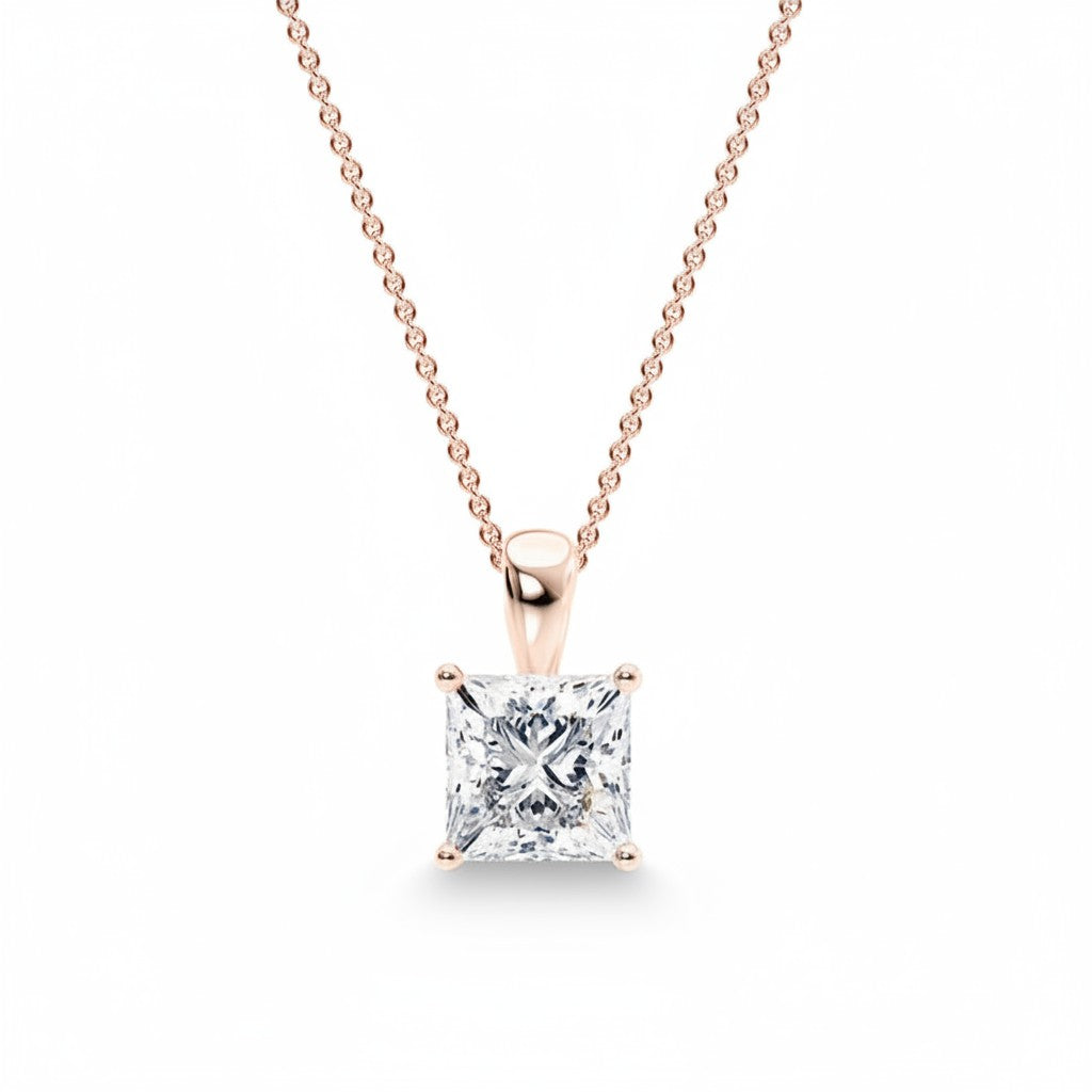 My Store 4 princess-cut diamond solitaire pendant on a delicate rose gold cable chain with a polished drop bail.