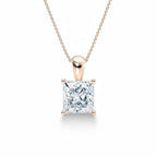 My Store 4 princess-cut diamond solitaire pendant in 18K yellow gold with a tapered drop bail on a fine cable chain.