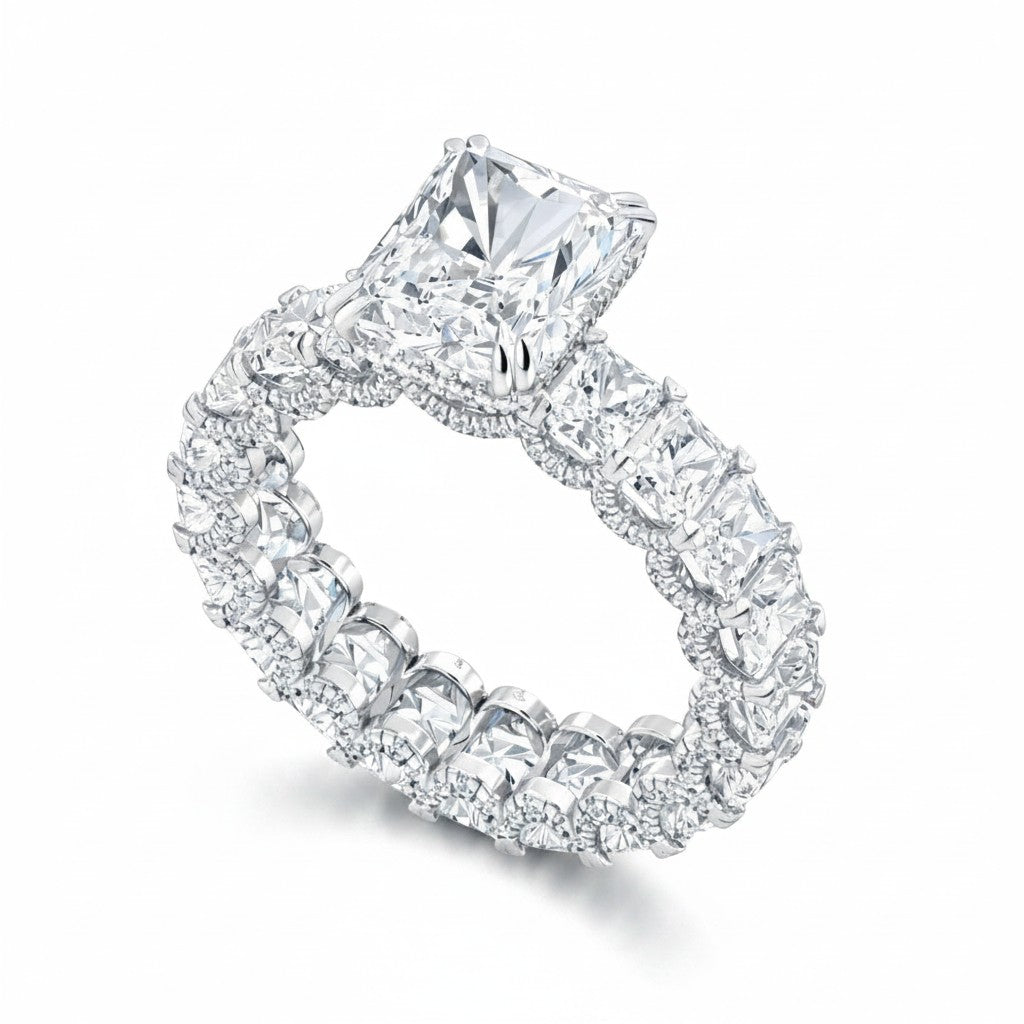 My Store 4 radiant cut diamond eternity band with a hidden halo and white gold setting on a white background.