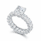 My Store 4 radiant cut diamond eternity band with a hidden halo and white gold setting on a white background.