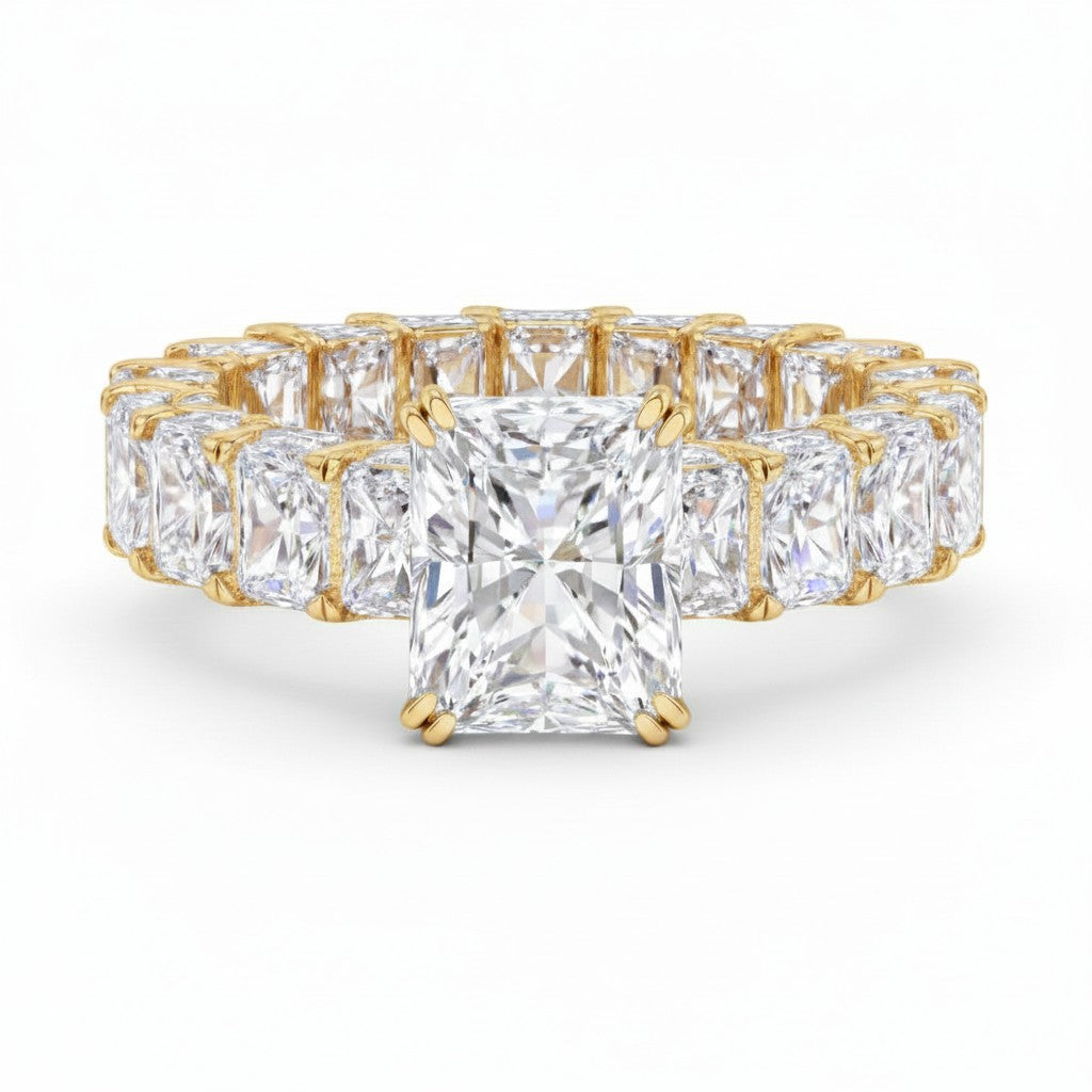 My Store 4 radiant cut diamond eternity band in yellow gold with a hidden halo setting and shared prong diamonds.