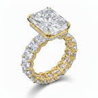 My Store 4 radiant cut diamond eternity band in yellow gold with a hidden halo and four-prong center setting.