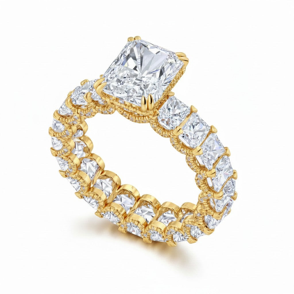My Store 4 radiant cut diamond eternity band in 18k yellow gold with a hidden halo and claw prong setting