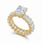 My Store 4 radiant cut diamond eternity band in 18k yellow gold with a hidden halo and claw prong setting