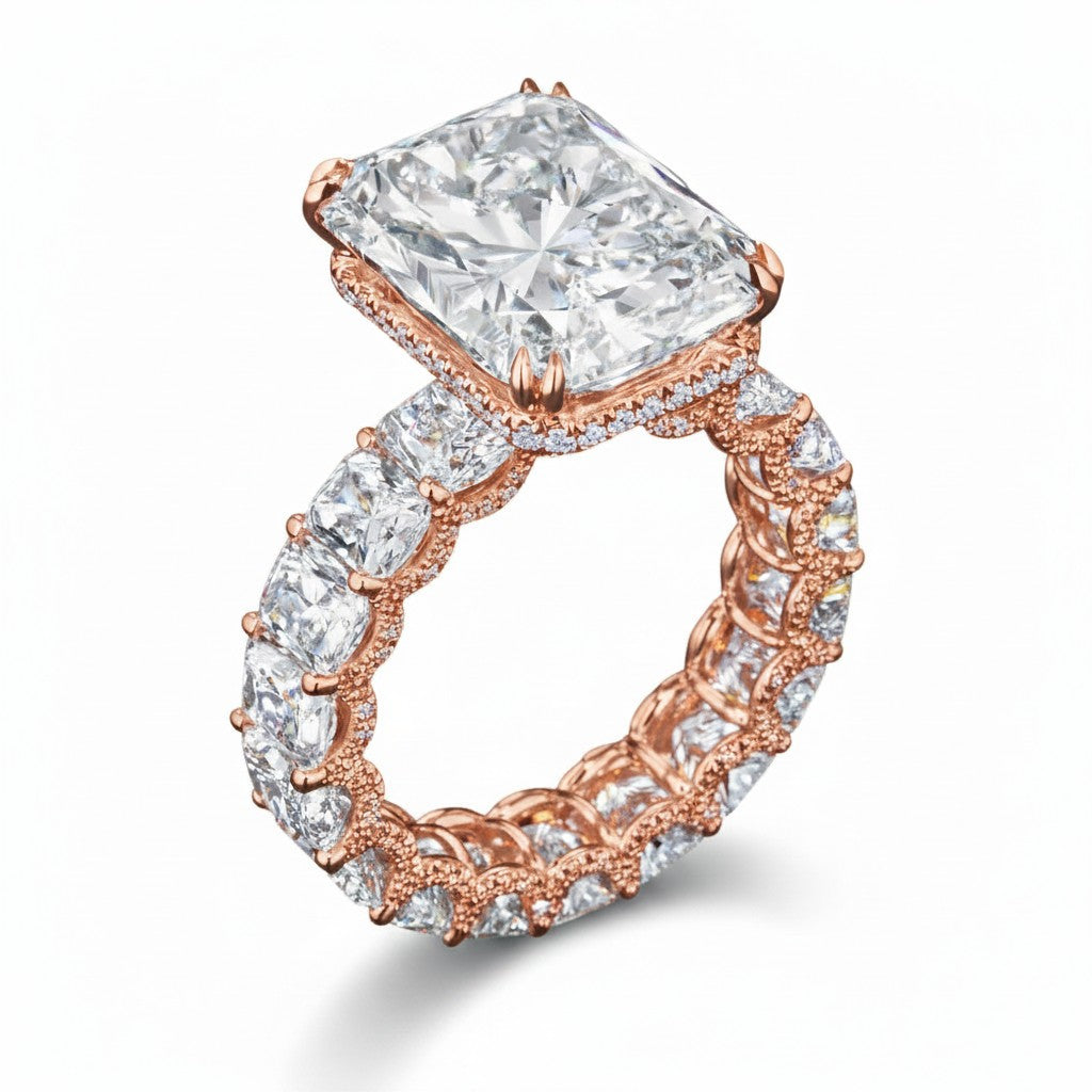 My Store 4 radiant cut diamond eternity band in rose gold with a hidden halo and double-claw prong center setting.