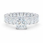 My Store 4 radiant cut diamond eternity band with a prominent center stone and micro-pavé hidden halo in white gold.