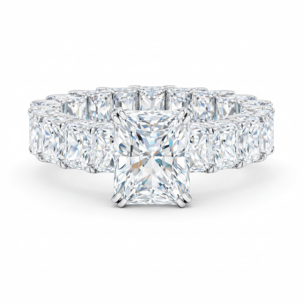My Store 4 radiant cut diamond eternity band with a prominent center stone and micro-pavé hidden halo in white gold.