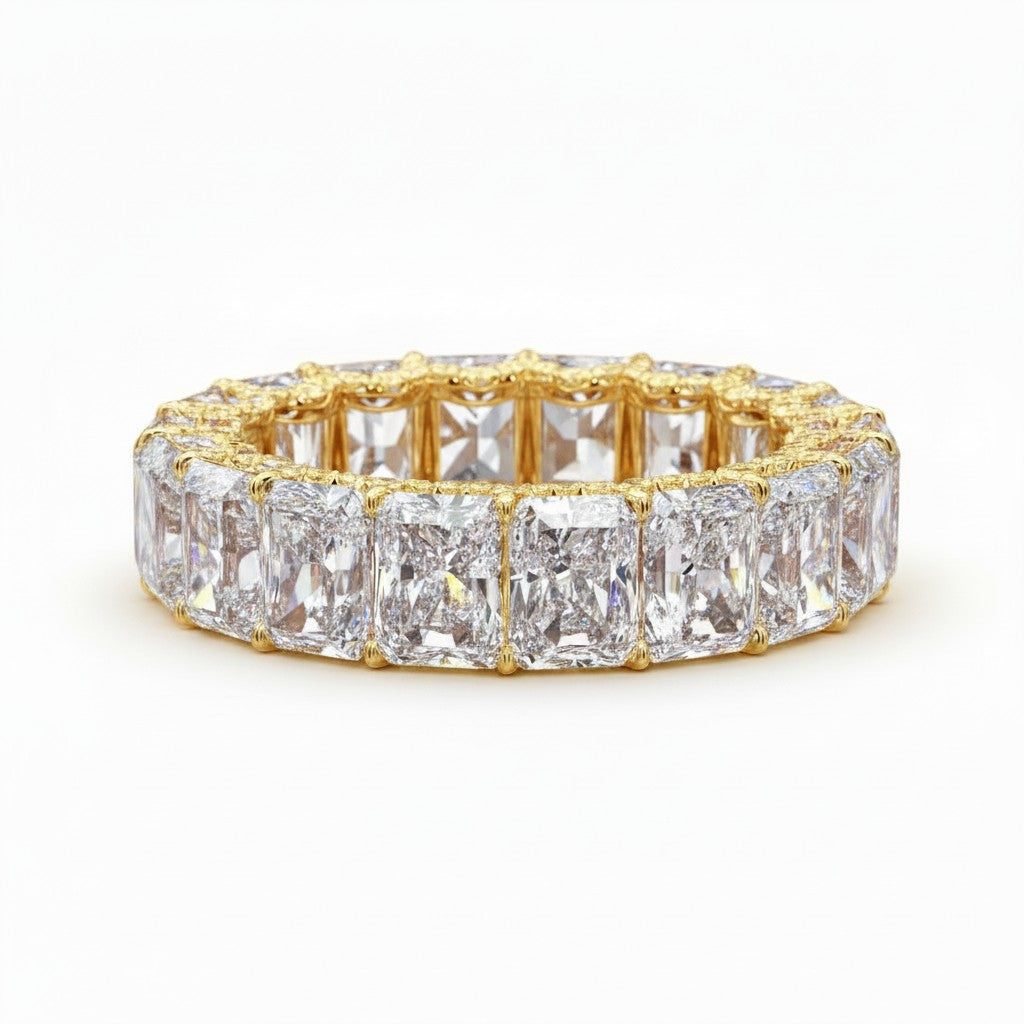 My Store 4 radiant-cut diamond eternity band in yellow gold with continuous stones for a sparkling bridal look.