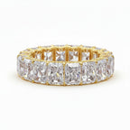 My Store 4 radiant-cut diamond eternity band in yellow gold with continuous stones for a sparkling bridal look.