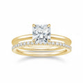 My Store 4 radiant cut solitaire engagement ring with a matching micro-pavé eternity wedding band in yellow gold.