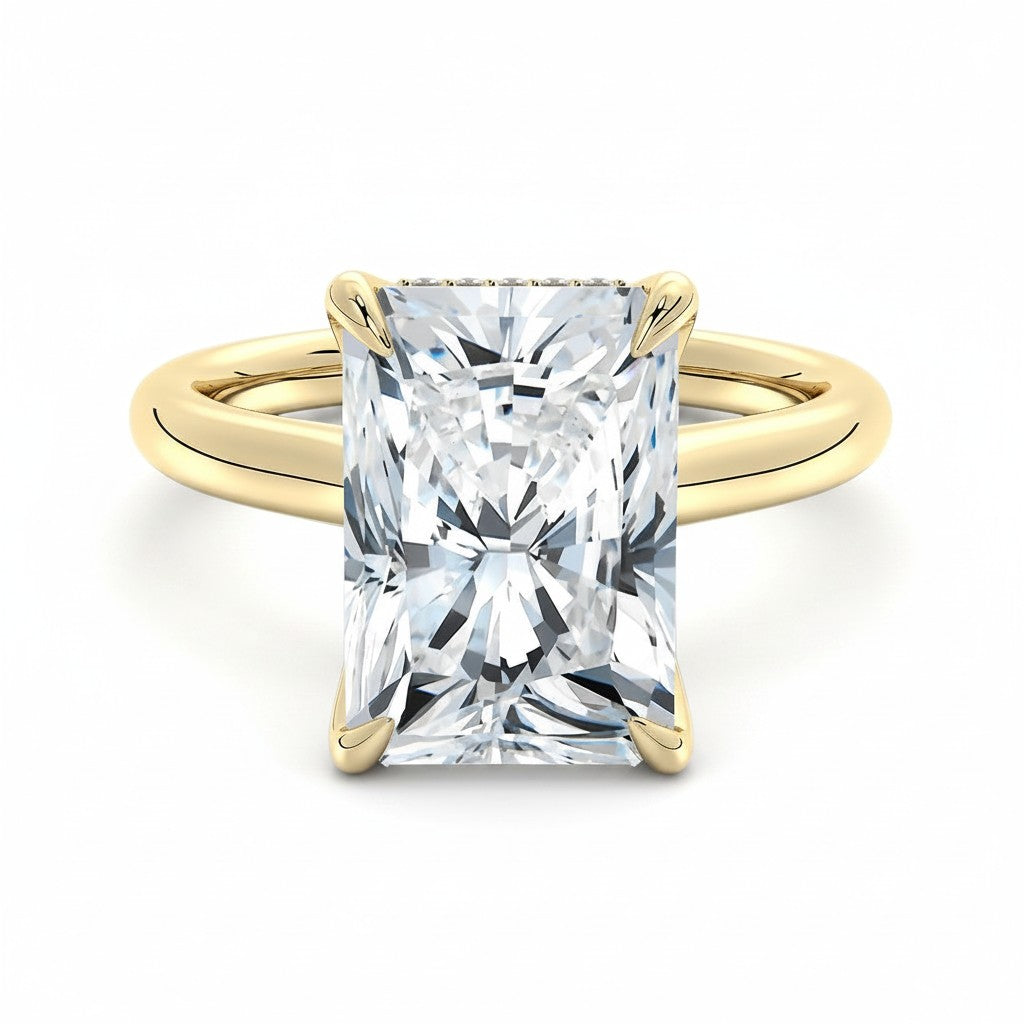 My Store 4 radiant cut solitaire engagement ring in solid yellow gold with a hidden halo and split shank design.