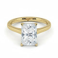 My Store 4 radiant cut solitaire engagement ring in yellow gold with a hidden halo and cathedral shoulders