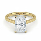 My Store 4 radiant cut solitaire engagement ring in yellow gold with a hidden halo and cathedral shoulders