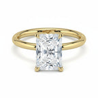 My Store 4 radiant cut solitaire engagement ring with a high-polished yellow gold band and four-prong setting.