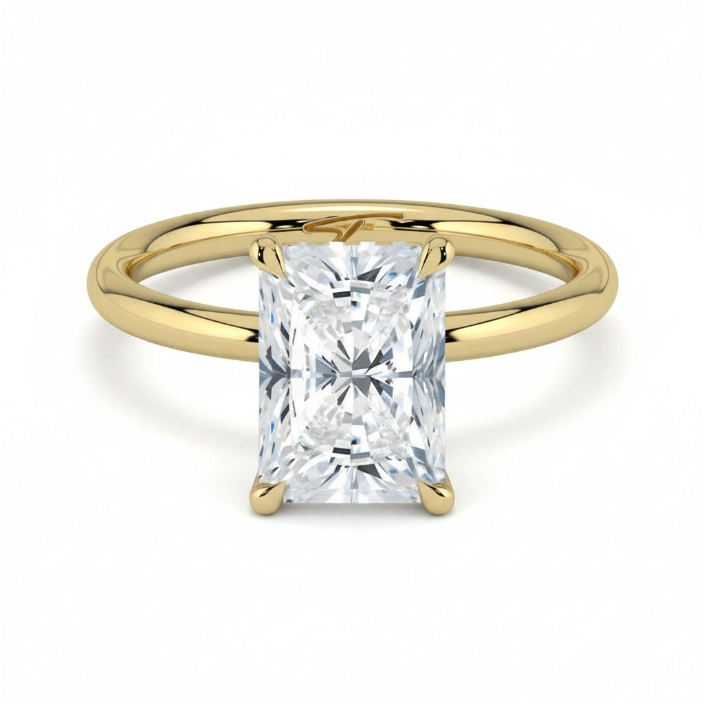 My Store 4 radiant cut solitaire engagement ring with a high-polished yellow gold band and four-prong setting.