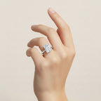 My Store 4 radiant cut solitaire engagement ring with hidden halo and split shank on a woman's finger