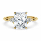 My Store 4 radiant cut three-stone engagement ring with trillion side diamonds in polished yellow gold