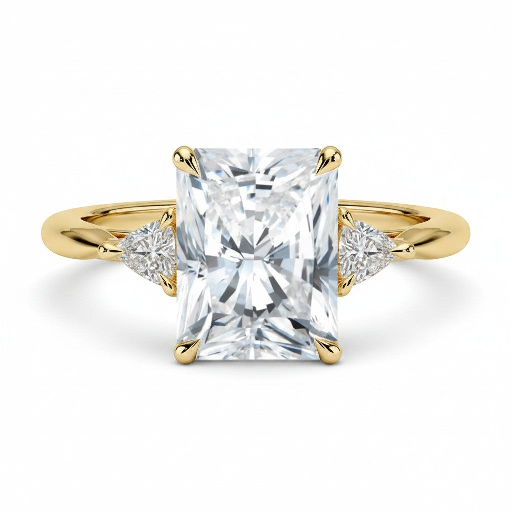 My Store 4 radiant cut three-stone engagement ring with trillion side diamonds in polished yellow gold