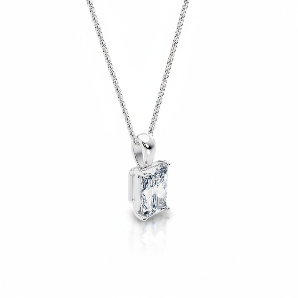 My Store 4 radiant-cut diamond solitaire pendant on a fine white gold chain with a polished bail.