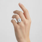 My Store 4 18K solid gold radiant cut lab-grown diamond engagement ring with a vintage halo setting on a woman's hand.