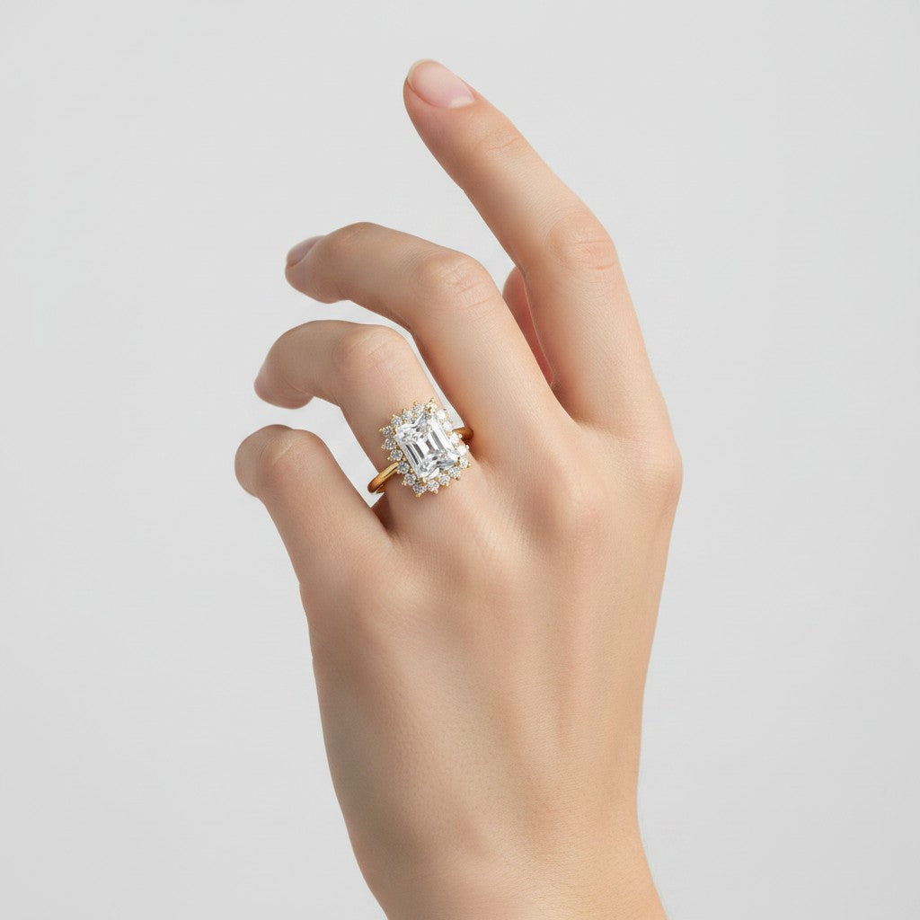 My Store 4 radiant-cut lab diamond engagement ring with a vintage halo setting in 18K solid gold worn on a hand