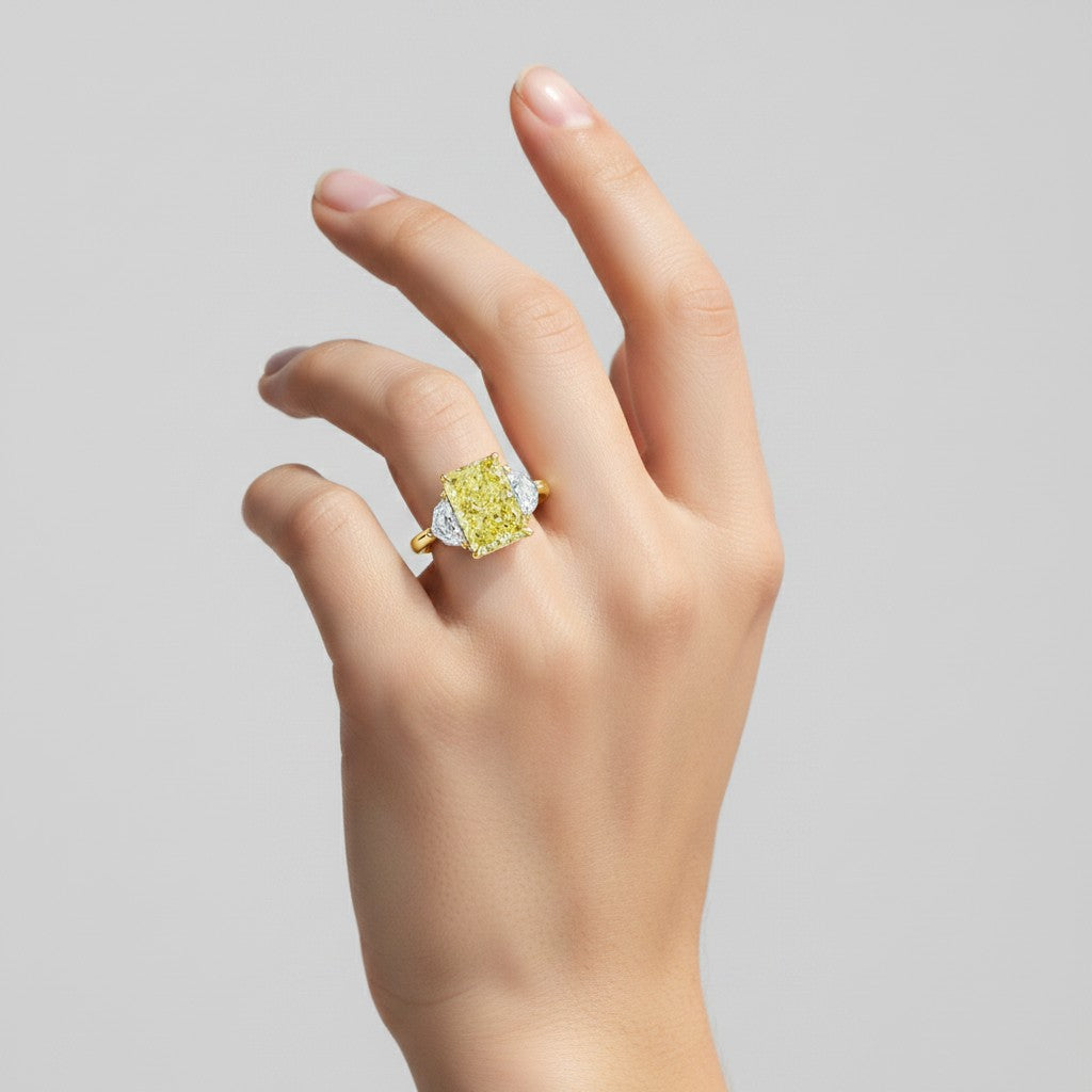My Store 4 18K solid gold trilogy ring with a radiant-cut fancy yellow lab-grown diamond on a woman's finger