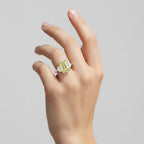 My Store 4 18K solid gold trilogy ring featuring a radiant-cut fancy yellow lab-grown diamond on a woman's hand.