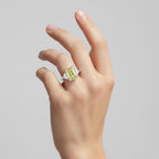 My Store 4 18K solid gold trilogy ring featuring a radiant-cut fancy yellow lab-grown diamond on a woman's hand.