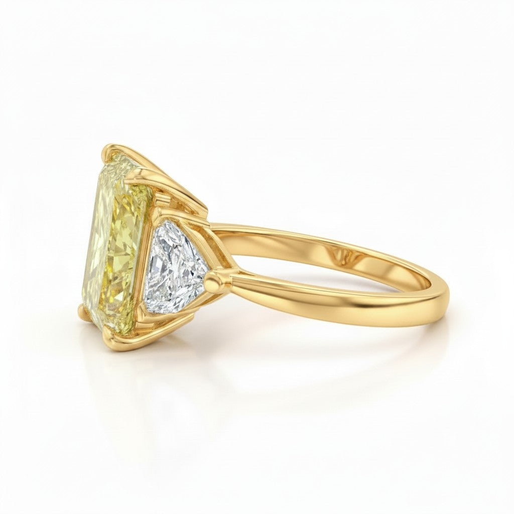 My Store 4 18K solid gold trilogy ring featuring a radiant-cut fancy yellow lab-grown diamond and trillion side stones