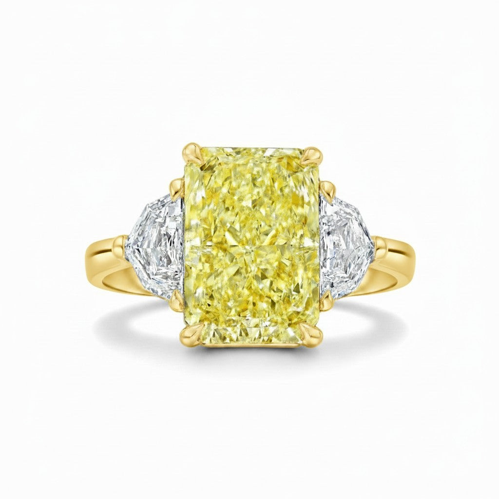 My Store 4 18K solid gold trilogy ring featuring a radiant-cut fancy yellow lab-grown diamond and side stones.