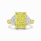 My Store 4 18K solid gold trilogy ring featuring a radiant-cut fancy yellow lab-grown diamond and side stones.