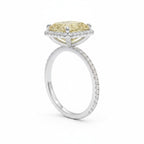 My Store 4 18K solid gold ring featuring a radiant-cut fancy yellow diamond with a sparkling diamond halo setting.