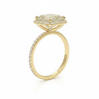 My Store 4 18K solid gold radiant-cut fancy yellow diamond halo ring with pavé diamond band, side view.