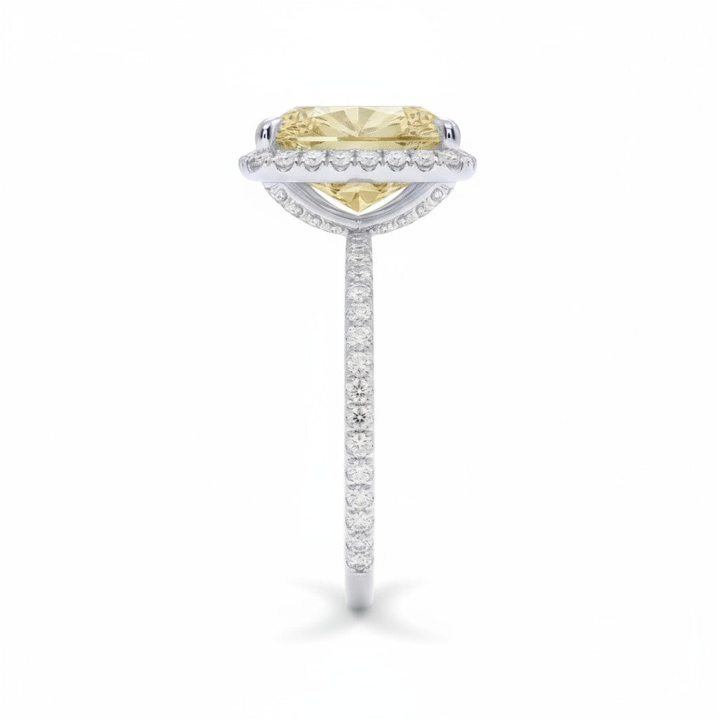 My Store 4 18K gold ring featuring a radiant-cut fancy yellow diamond with a sparkling diamond halo side profile view