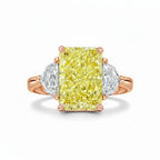 My Store 4 18K rose gold trilogy ring featuring a radiant-cut fancy yellow lab-grown diamond and two side diamonds.