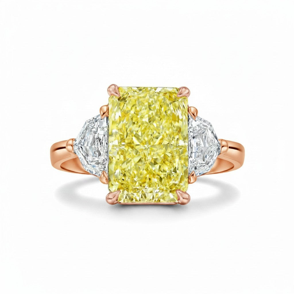 My Store 4 18K rose gold trilogy ring featuring a radiant-cut fancy yellow lab-grown diamond and two side diamonds.