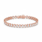 My Store 4 rose gold tennis bracelet featuring round brilliant diamonds in a protective bezel setting with a box clasp.