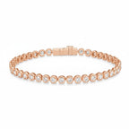 My Store 4 modern bezel round diamond tennis bracelet in 14K rose gold with a secure integrated box clasp.
