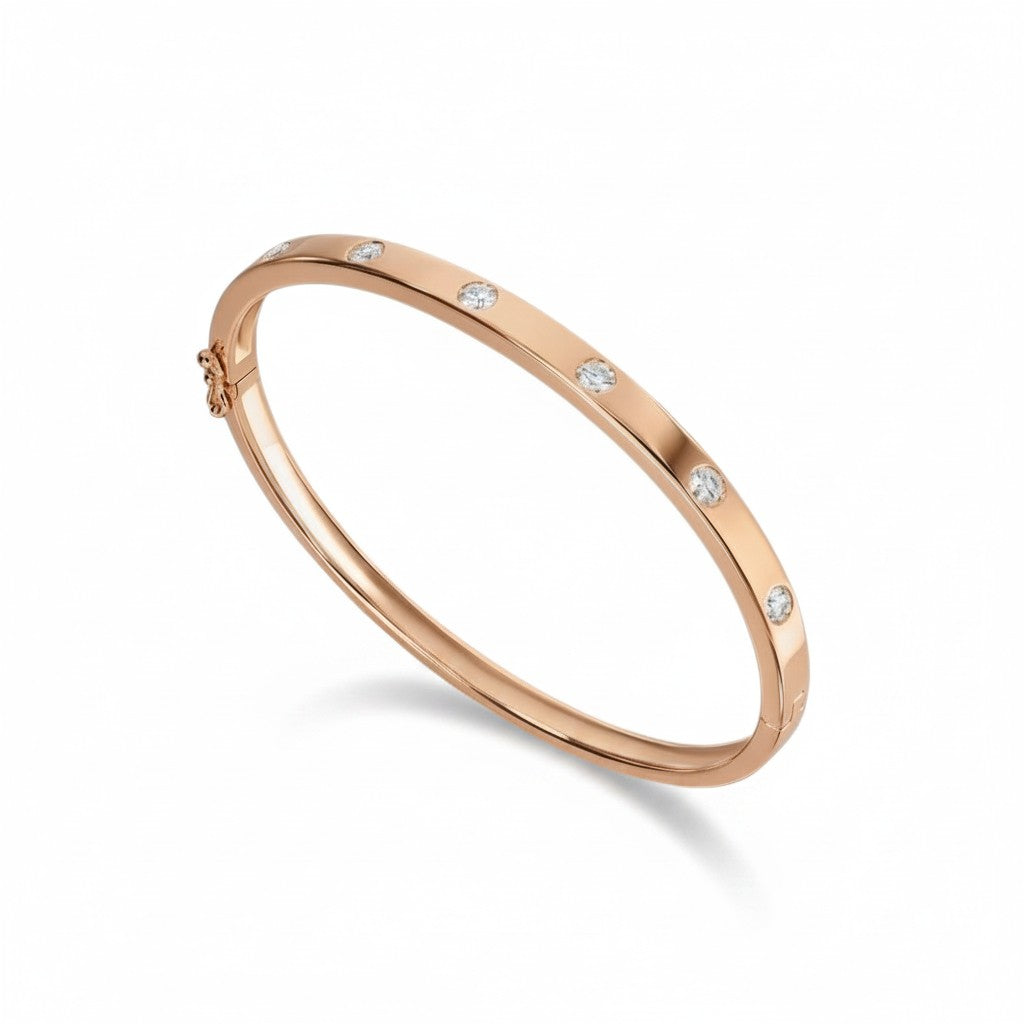 My Store 4 rose gold bangle bracelet featuring round flush-set diamonds in a sleek, snag-free design.