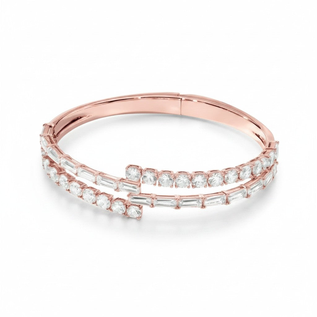 My Store 4 rose gold open bypass bangle bracelet featuring alternating rows of baguette and round brilliant diamonds.