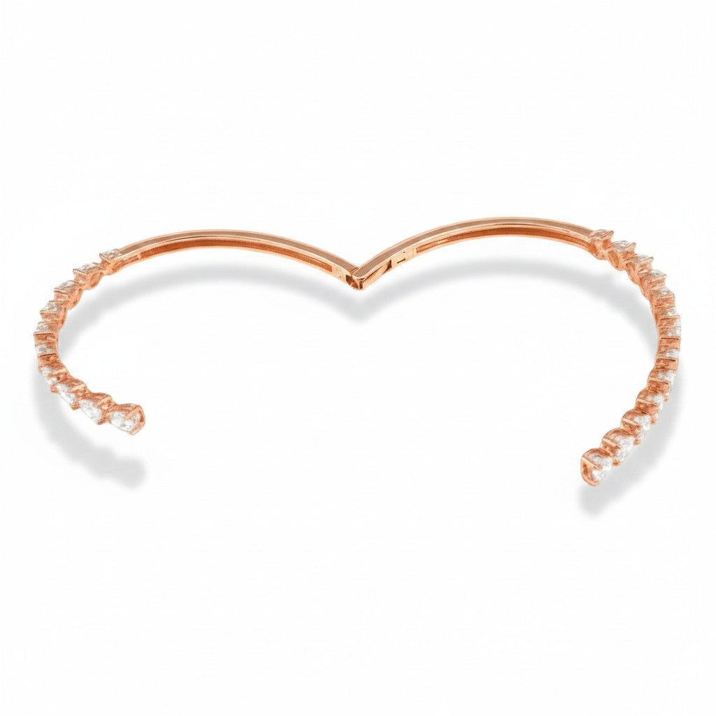 My Store 4 rose gold open bangle bracelet featuring alternating pear and heart cut diamonds in a bypass design.