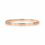 My Store 4 rose gold bangle bracelet featuring round diamonds in a smooth flush setting for a snag-free design.