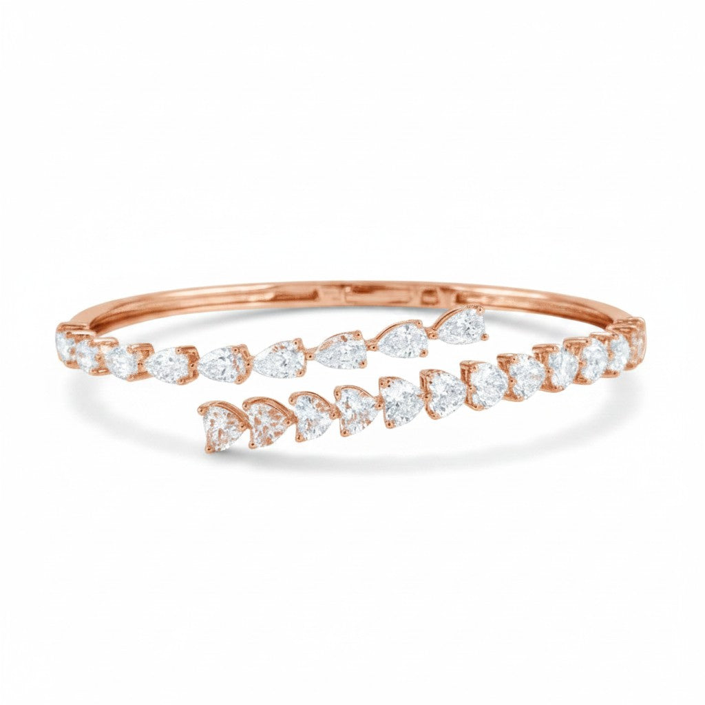 My Store 4 rose gold bypass open bangle bracelet featuring alternating pear-cut and heart-cut diamond stones.