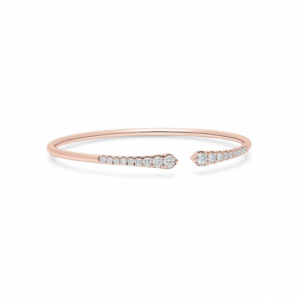 My Store 4 rose gold open cuff bracelet featuring graduated round brilliant diamonds in a shared-prong setting.