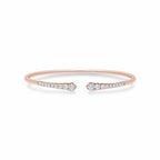 My Store 4 rose gold open cuff bracelet featuring graduated round brilliant diamonds in a shared-prong setting