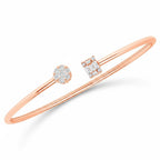 My Store 4 rose gold open cuff bracelet featuring a round diamond cluster and a rectangular baguette diamond motif.
