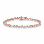 My Store 4 rose gold tennis bracelet featuring an alternating pattern of pear-cut and round-cut diamonds.